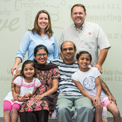 Cheryl Alvares, with husband, Jason, and daughters Hannah and Abigail, and Julie and Terry