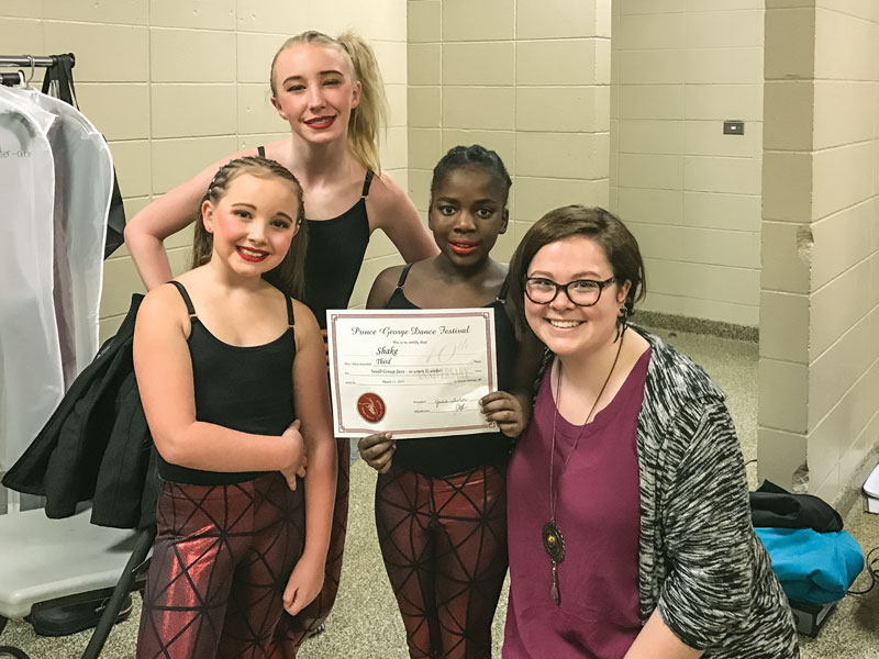 Kessa Wilkinson celebrates a dance competition win with Hannah and Victoria Law and Pamela van Dijk