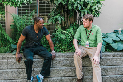 Photo of Jordan Shaw and a resident of the Army's Harbour Light treatment program