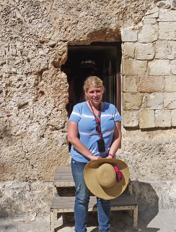 Diane stands in front of the open tomb that many believe to be Jesus