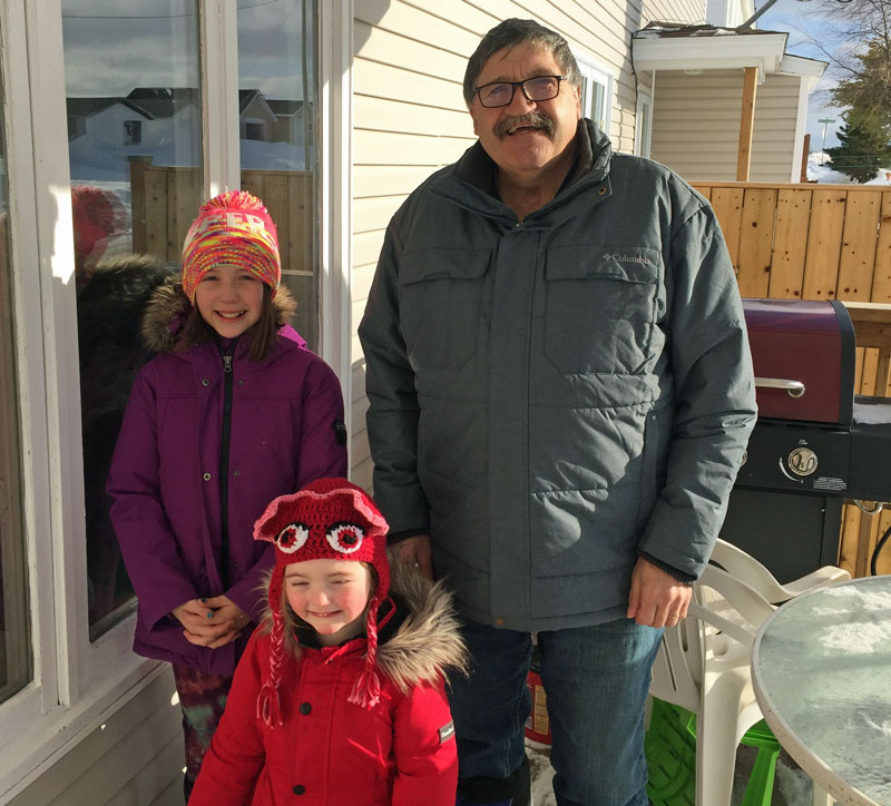 Gary Penney and his two granddaughters