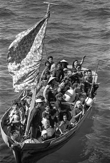 Vietnamese boat people are rescued by the U.S. Navy near Cam Ranh Bay, Vietnam