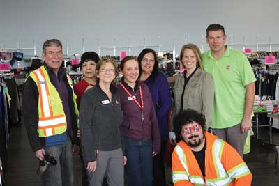 Lts Jennifer and Robert Henson with staff from the Westbank Salvation Army thrift store