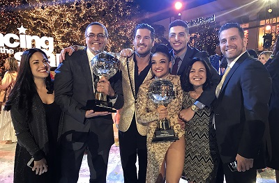 Laurie posing with the Mirrorball trophy 