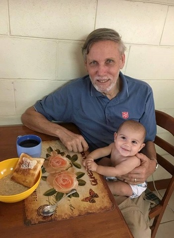 Major Bill Barthau spends time with his granddaughter, Hadassah