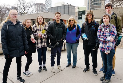 Nancy Harrison and the youth group from The Salvation Army’s Northridge Community Church prepare to hand out cookies around Toronto City Hall