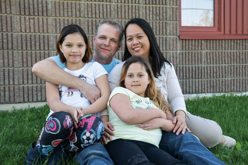 “It’s more than a church; it’s a community,” says Remko van Rhijn, with his wife, Ning, and their daughters Lianna and Tala