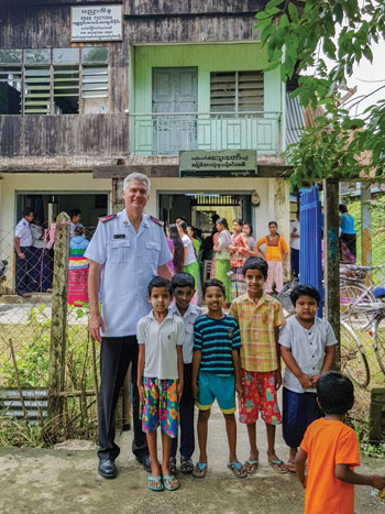 Colonel Edward Hill engages in ministry in Dallah, Myanmar