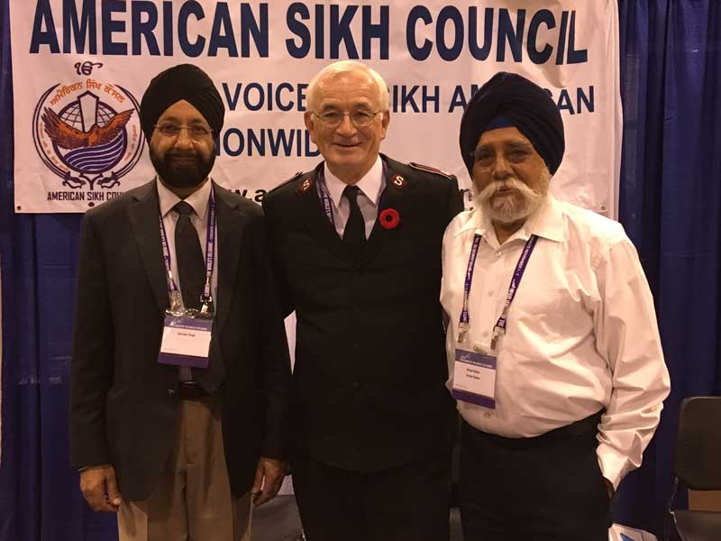 Lt-Col Jim Champ meets with members of the Sikh community