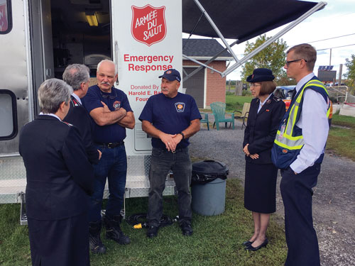 Commissioner Susan McMillan, territorial commander, and Salvation Army leaders meet EDS volunteers in Ottawa