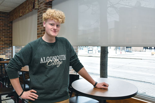 Jonah Bulgin in the cafeteria at Booth University College