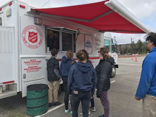 A Salvation Army canteen serves a group of young people