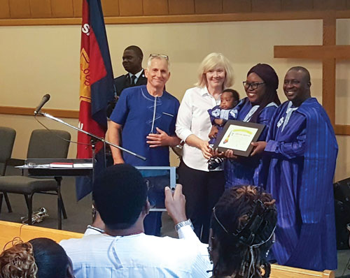 Supported by his parents, Kairos Umudi-Harrison is dedicated at Bloor Central Corps by Majors Doug and Karen Hammond