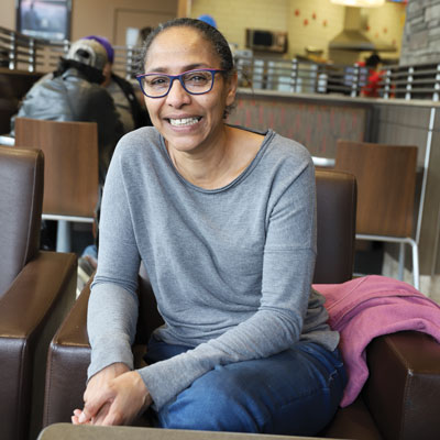 Raqiya is all smiles at a cafe