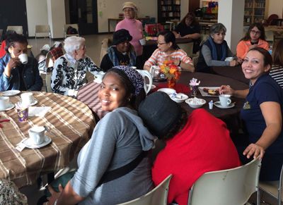 Photo of women around a table