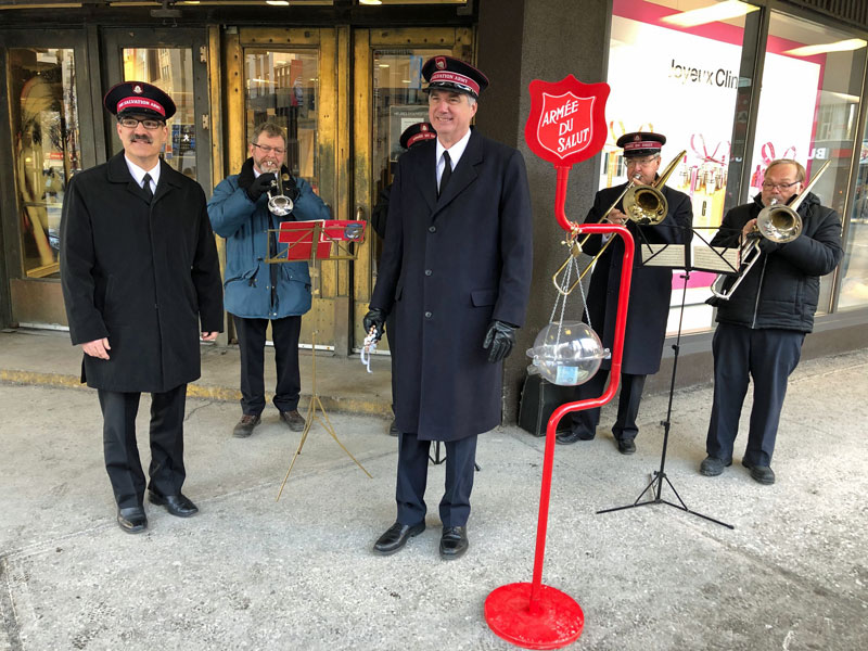 Colonel Edward Hill, chief secretary, rings the kettle bells in Montreal