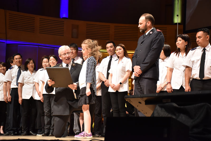 General Brian Peddle walks Heather Ramsay through her Junior Soldier Promise