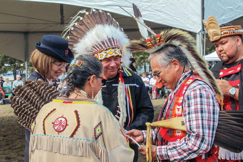 At the Pine Lake pow wow, Commissioner Susan McMillan receives a second eagle feather to add to The Salvation Army’s eagle staff