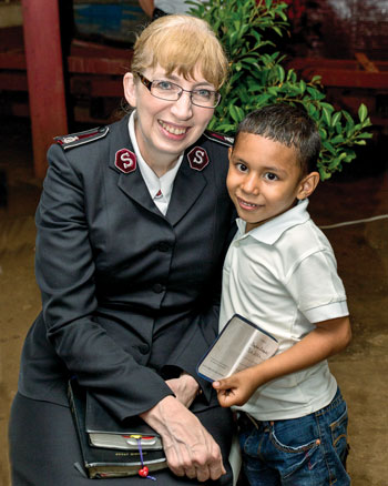 Commissioner Susan McMillan with a young boy in Nicaragua