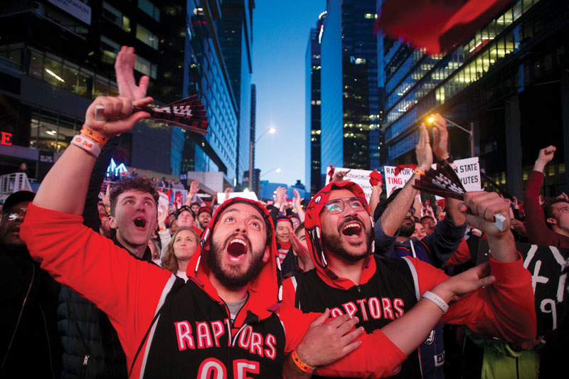 Toronto Raptors fans watch the NBA finals in “Jurassic Park,” the fan zone in downtown Toronto