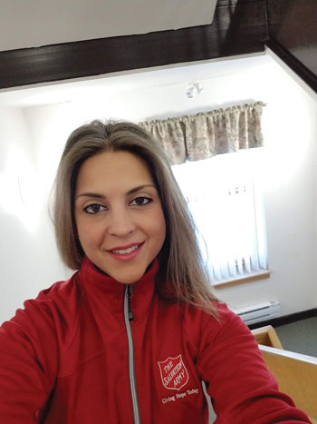 Alice Johansson selife in a red Salvation Army sweater