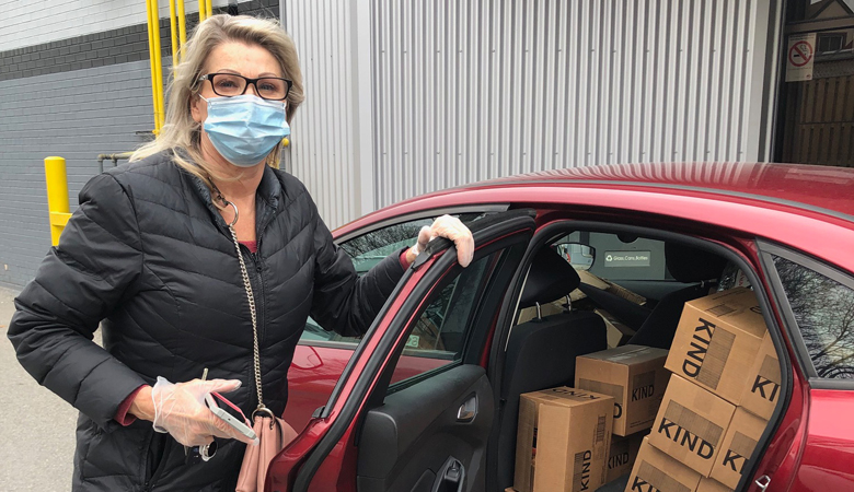 Dandy Blackwell with her car full of donations.