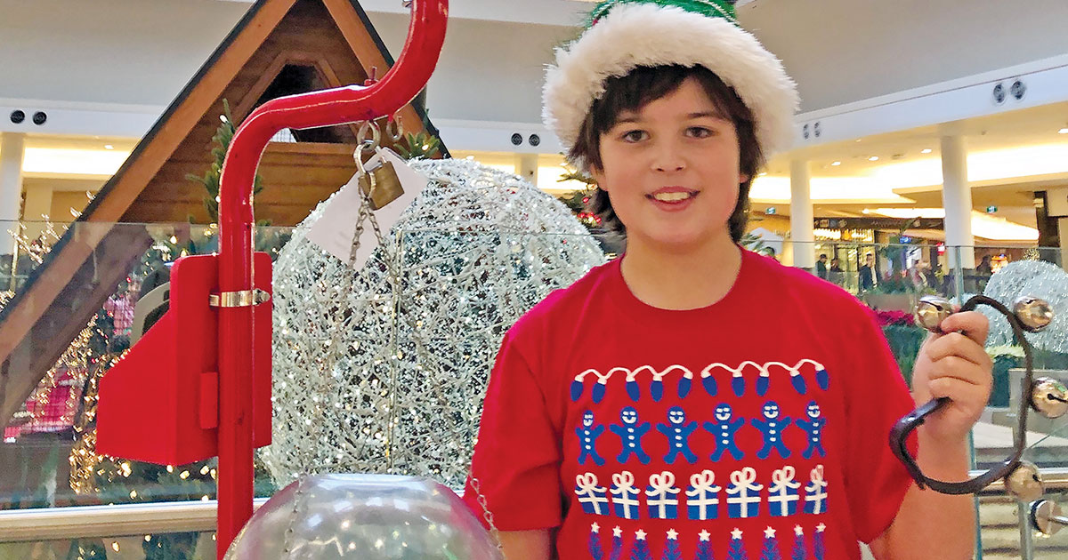 Lincoln Dugas-Nishisato takes a turn on the Salvation Army kettle
