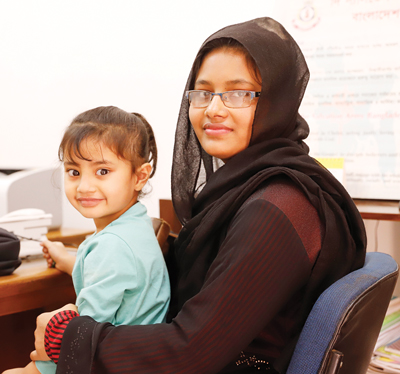 Photo of young mother and child at tuberculosis control clinic