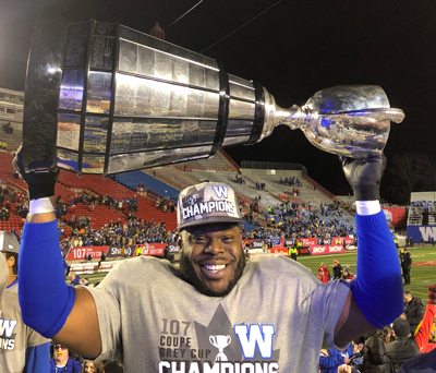 Drake Nevis celebrates at the end of the 2019 Grey Cup