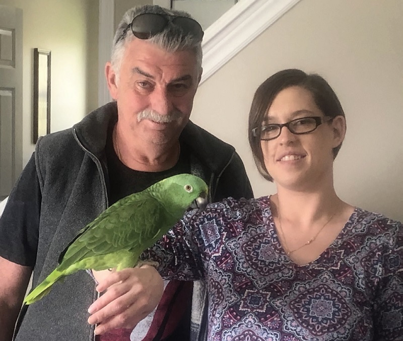 Richard Smith, his niece, Amanda, and a fine-feathered friend