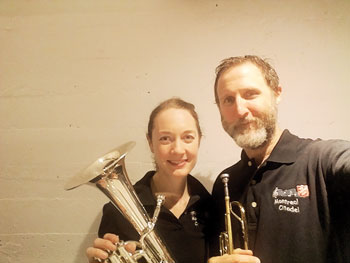 Edward Herba and his wife, Dara Murphy take a selfie with their instruments.