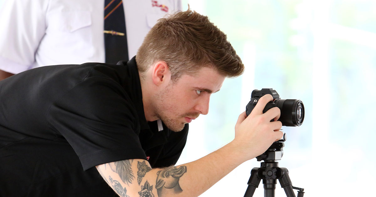 Aaron Bowes sets up a shot for an interview at Salvation Army headquarters in Lusaka, Zambia