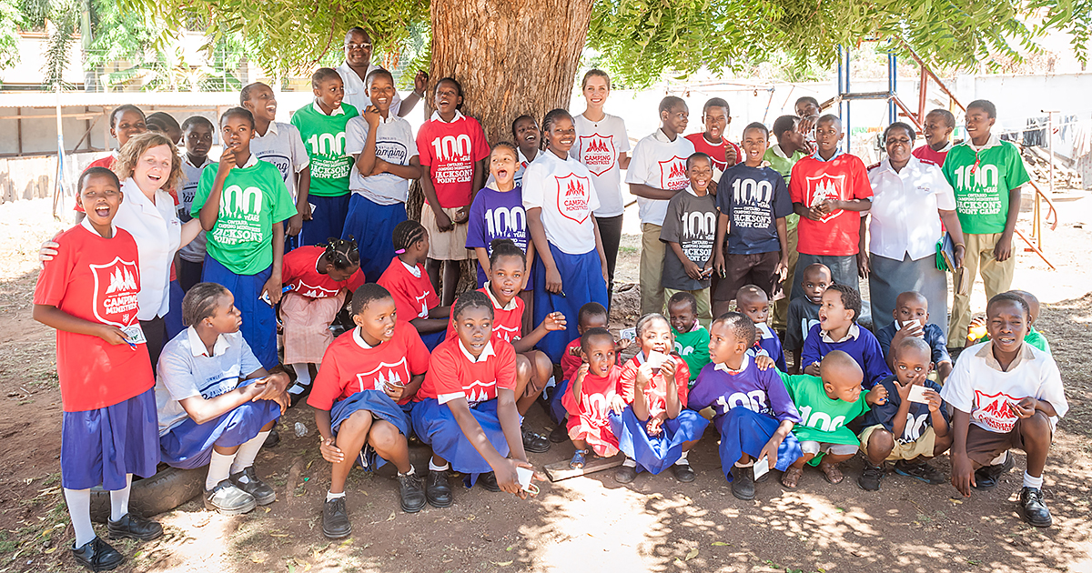 Residents at Mombasa Children’s Home in Kenya receive Ontario Camping Ministries T-shirts