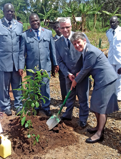 Photo: Lt-Cols Vincent plant a tree in Mautuma District, Kenya