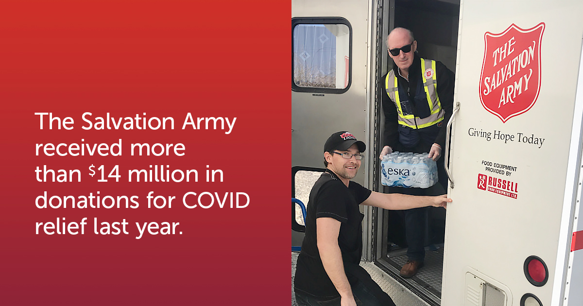 Volunteers deliver water in a Salvation Army van.