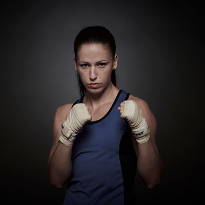 Mandy Bujold holds up her fists in a fight stance