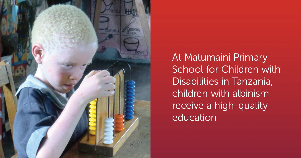 A boy plays with an educational toy at Matumaini Primary School.
