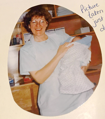 Sylvia holds baby Allan the day he was born