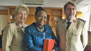 Cols Ian and Wendy Swan with the Minister of Religious and Moral Affairs, Government of Zambia