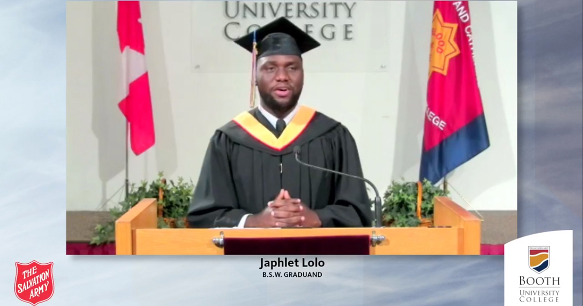 Class valedictorian Japhlet Lolo addresses his fellow graduates