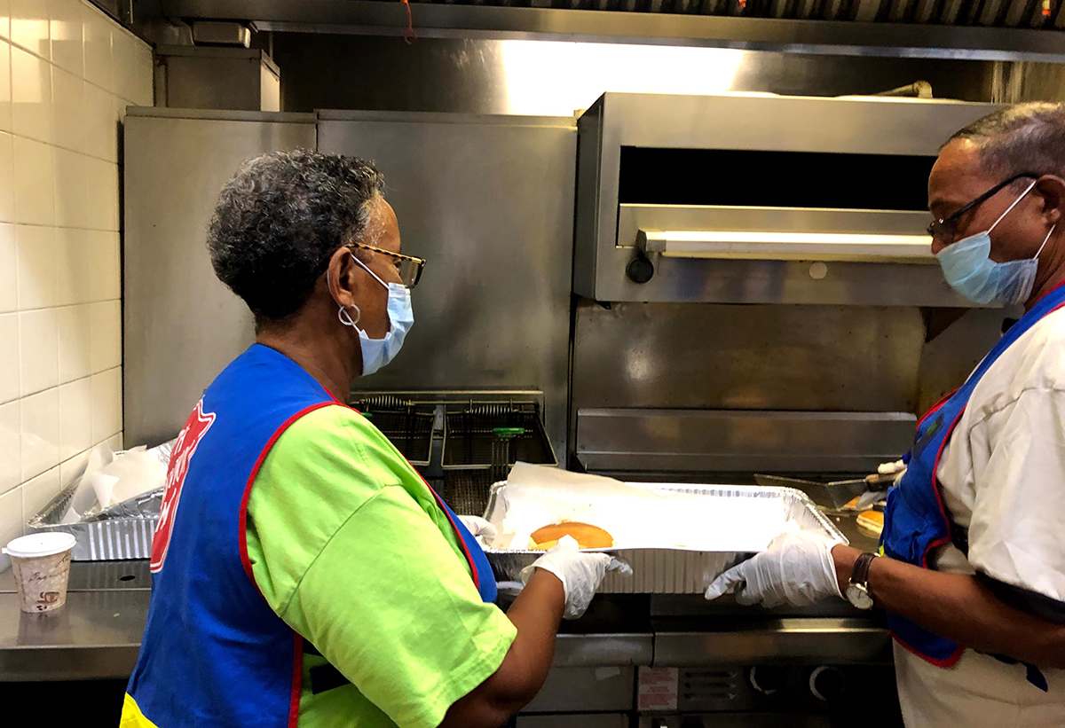 The EDS team in Bermuda prepares and serves food to those affected by hurricane Paulette last September