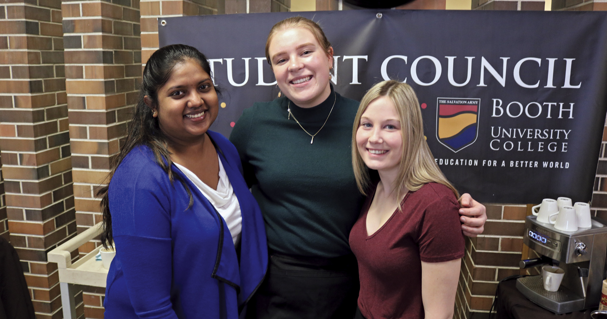 Students at a Booth University College open-house event