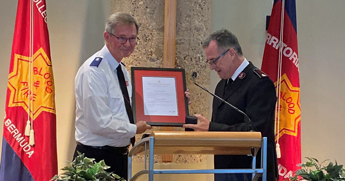 Dr. James Read receives the Order of the Founder from Commissioner Floyd Tidd