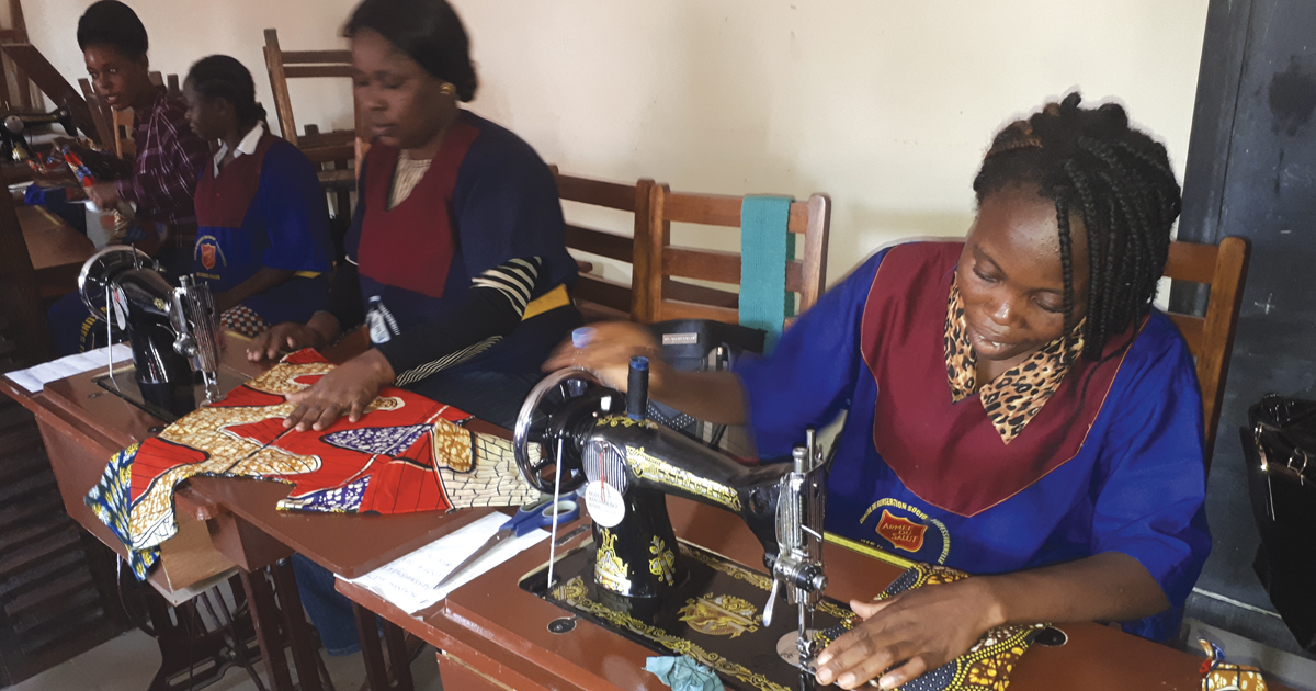 Women learn new skills in tailoring at a vocational training program in the Congo (Brazzaville) Territory