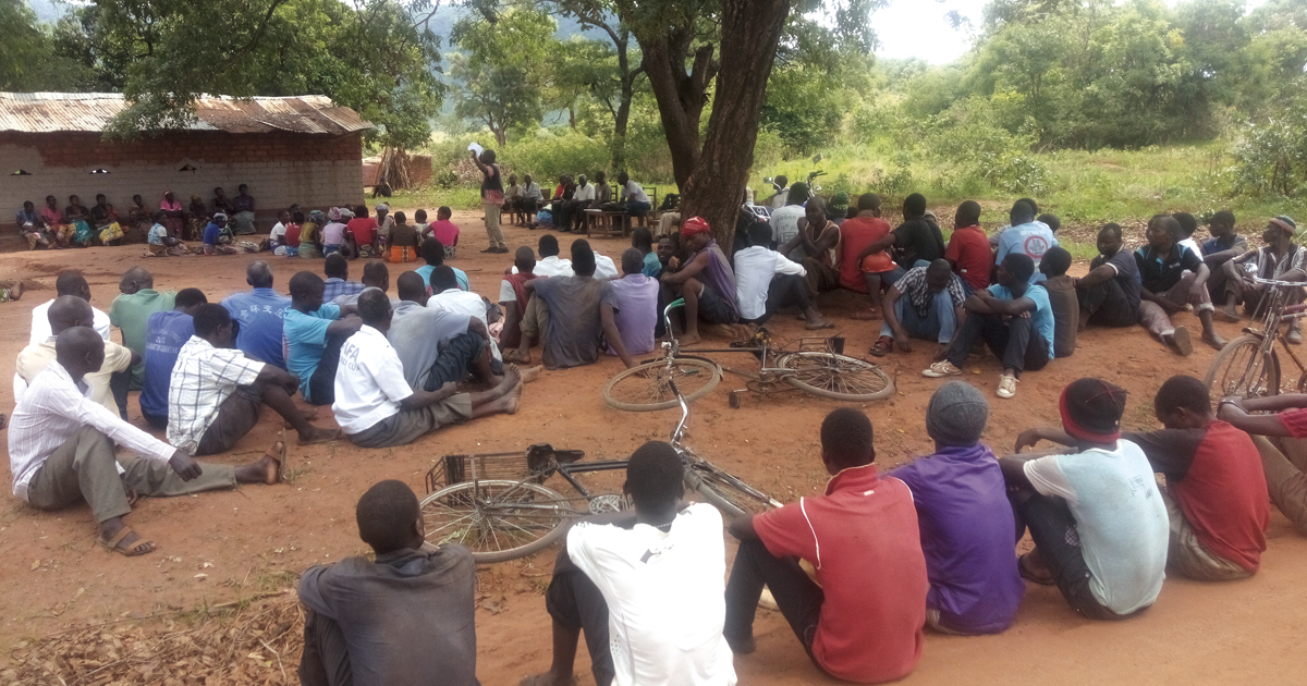 A Salvation Army child trafficking prevention team holds an awareness meeting in a Malawi village