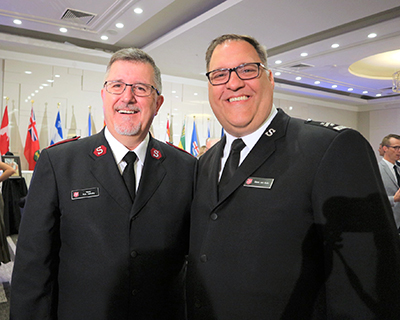 Mjr Rick Zelinsky and Glenn van Gulik, DSPR, Ont. Div, at the prayer breakfast