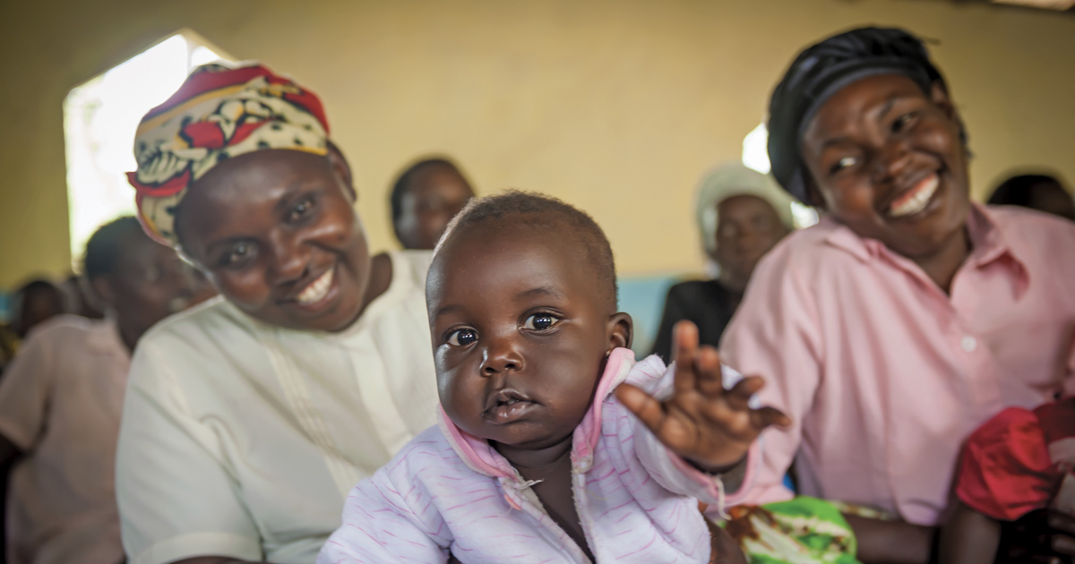 A mother receives health care and more at the integrated mother and child health project