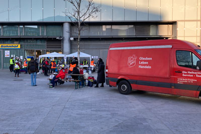 A Salvation Army van serves refugees