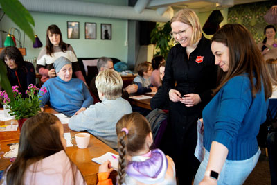 Refugees sitting around a table