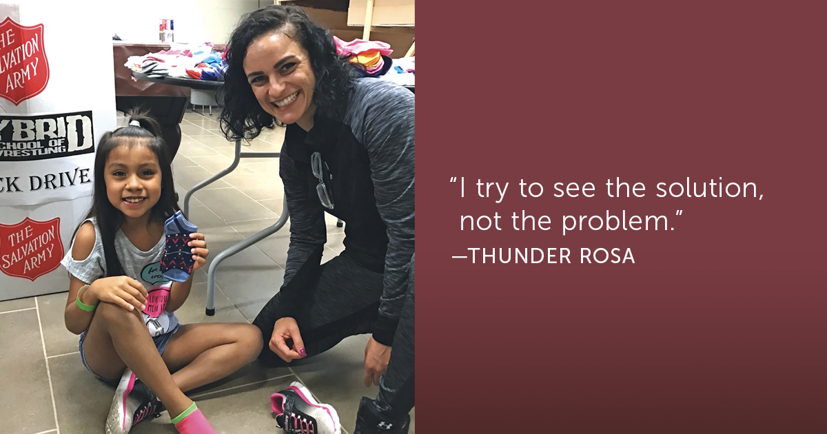 Thunder Rosa (Melissa Cervantes-Robles) volunteers at The Salvation Army’s annual Shoe-In event